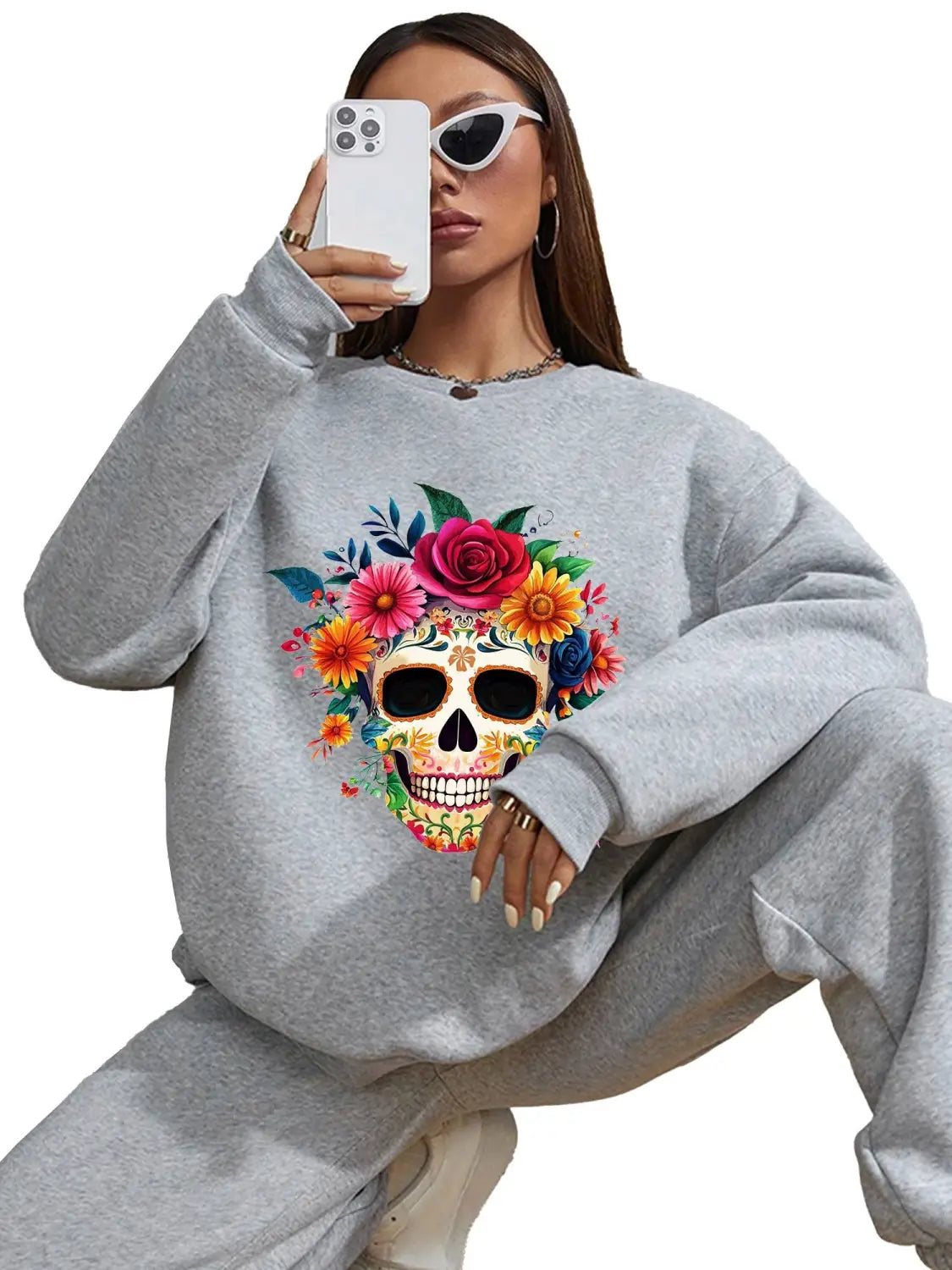 gray crew neck sweatshirt with a vibrant colorful floral skull design suitable for daily wear basic long sleeve clothing.