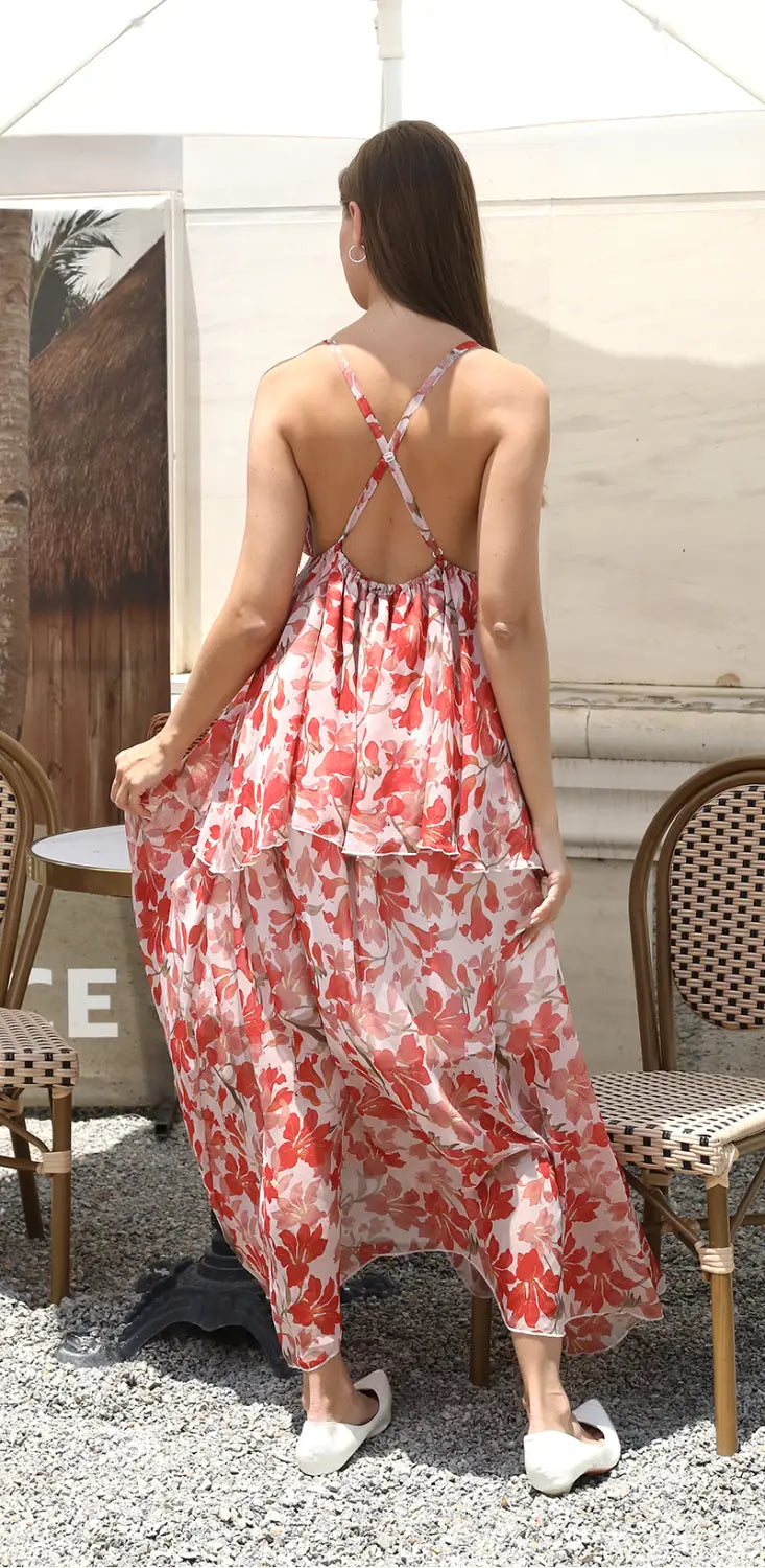 a flowing red floral ruffled fashion simple dress featuring two-toned fabric and crisscross back straps, ideal as a simple dress for elegant occasions