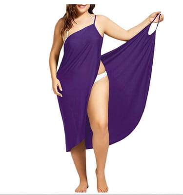 a flowing solid purple plus size suspenders beach skirt cover up dress with thin straps and a high side slit designed for beachwear