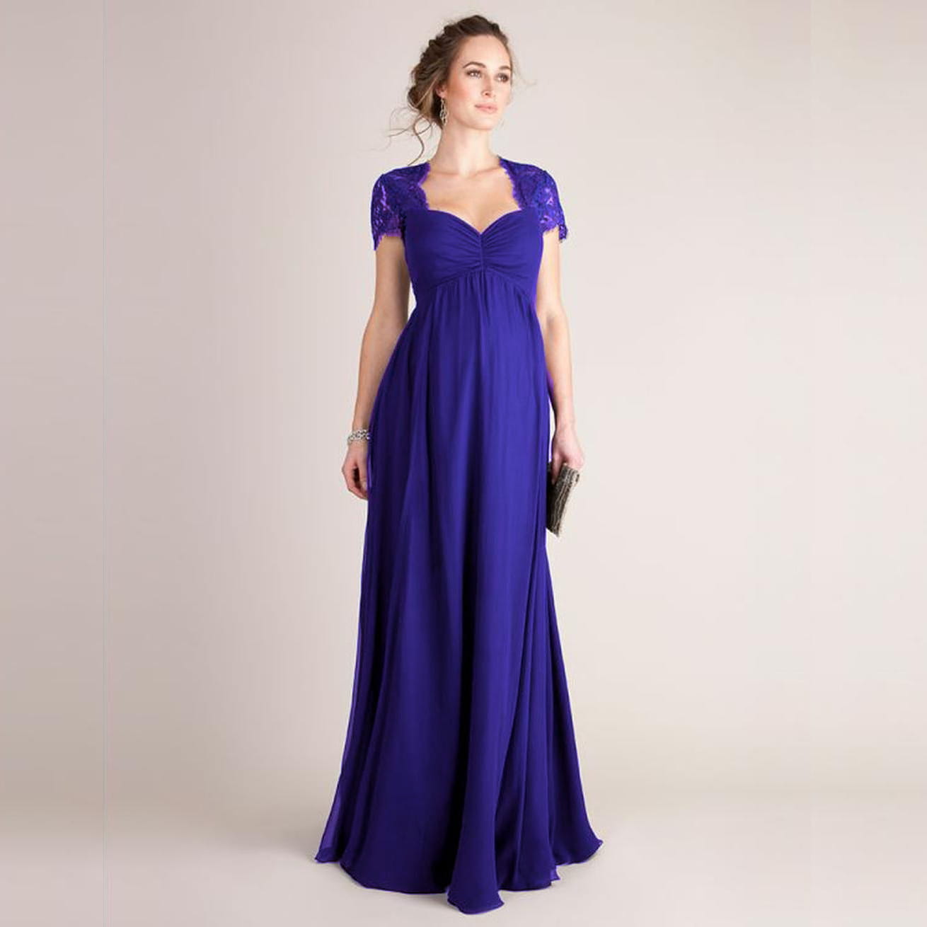 a flowing royal blue evening gown with lace cap sleeves and a fitted bodice featuring eyelashes lace stitching japanese cotton detailing