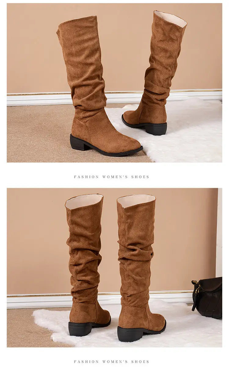 Tan slouchy sleeve suede high leg boots in brown with a ruched suede upper and black block heel.