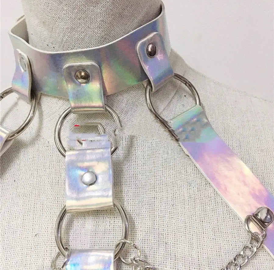 iridescent metallic choker with silver-toned rings and chain accents complementing a pink sequined fringe club stage dress for night club stage performances on a stage dress woman