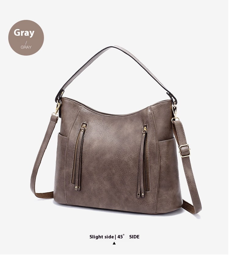 Gray faux leather large capacity luxury women leather hobo bag featuring dual zippers and tassel details