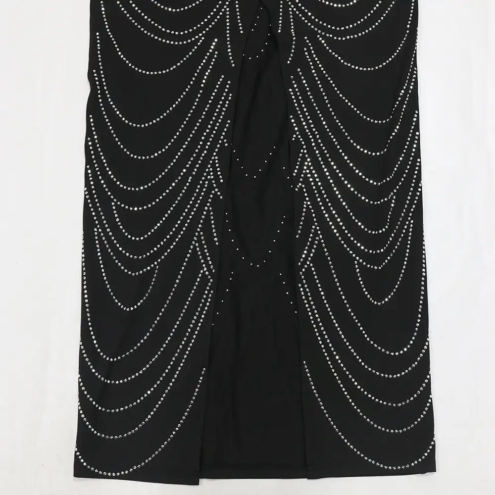 Black evening dress featuring sling hot drilling with intricate silver beadwork forming flowing curved patterns.