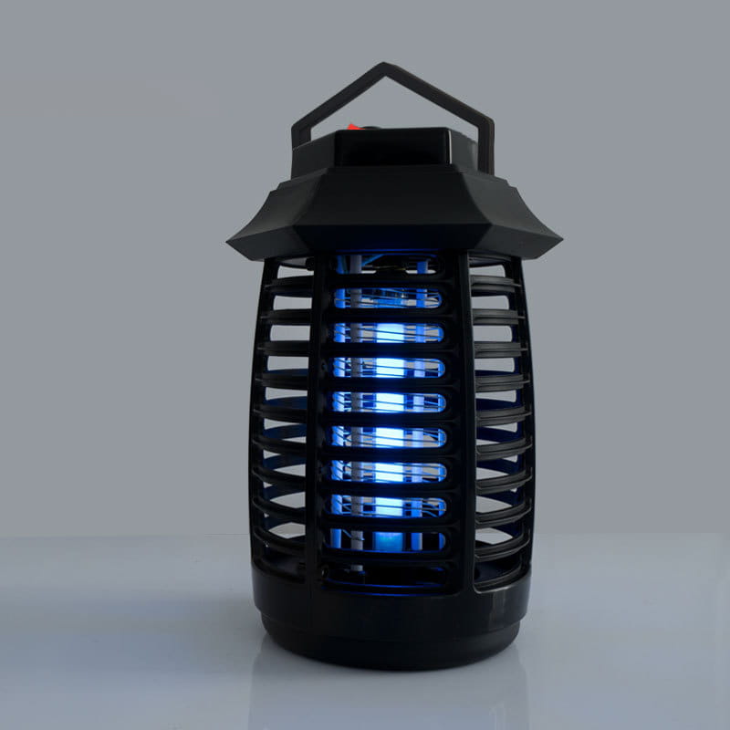 black plastic aromatherapy mosquito lamp electric uv insect killer with blue uv lights and a handle on top for effective mosquito killer use