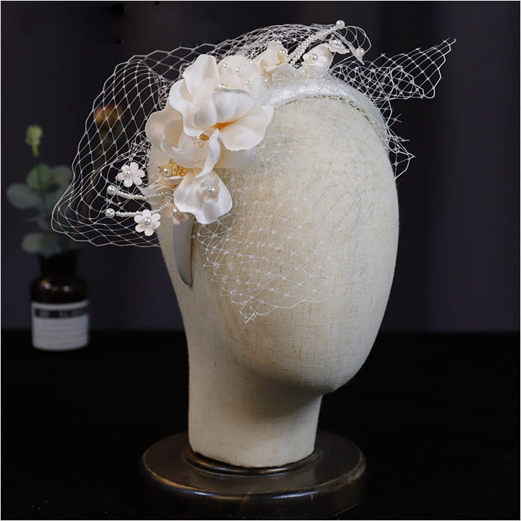 Elegant ivory pearl lace petal mesh hairband featuring delicate lace and pearl embellishments for a refined floral look.
