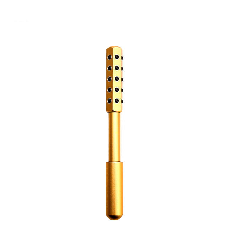gold-colored germanium beauty roller massage stick with a sleek cylindrical design and evenly spaced black circular indentations along the upper section.