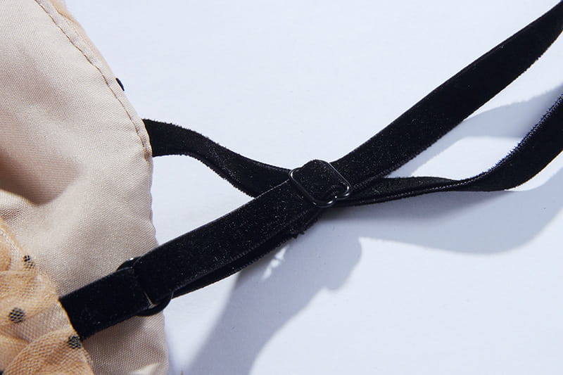 black velvet bra strap with metallic buckle paired with blush pink lace slim drawstring dress