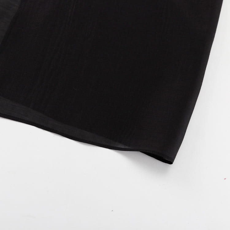 black sheer high waist slit sheath skirt fabric with smooth flowing texture highlighting the waist slit sheath design