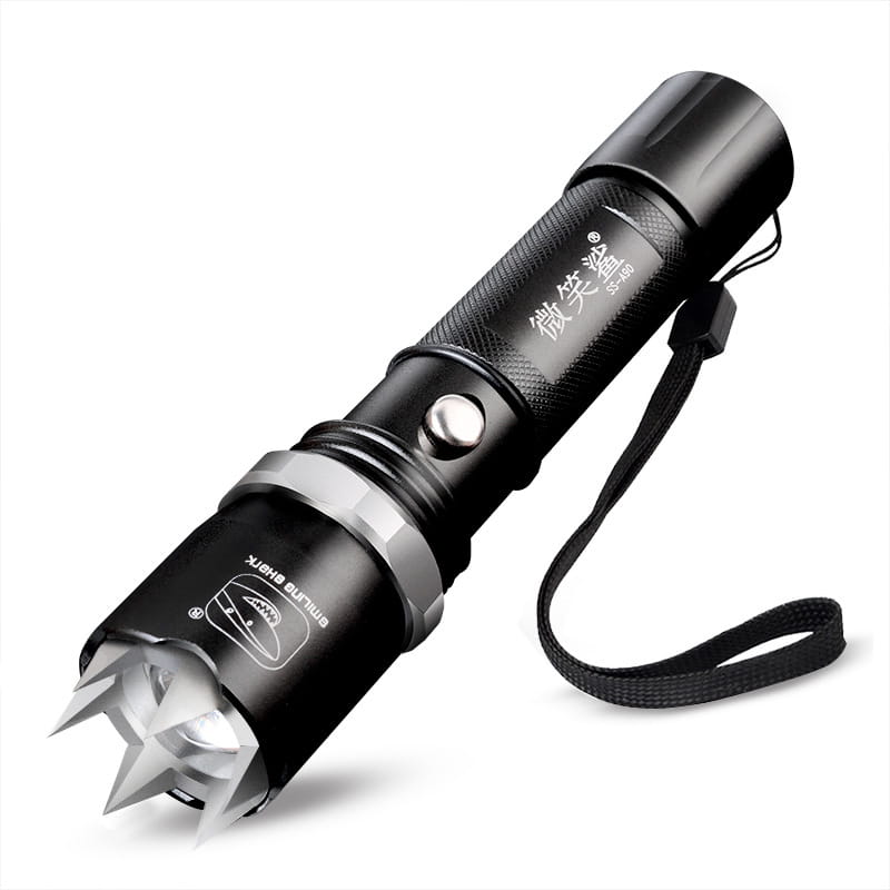 Black spiked tactical self-defense led flashlight with a textured grip and silver-tipped head designed for personal safety and emergency use.