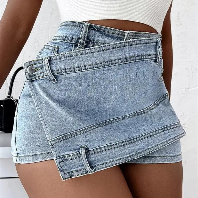 light-wash denim mini skirt with a layered asymmetrical design and visible stitching details in y2k street vintage style street vintage denim material