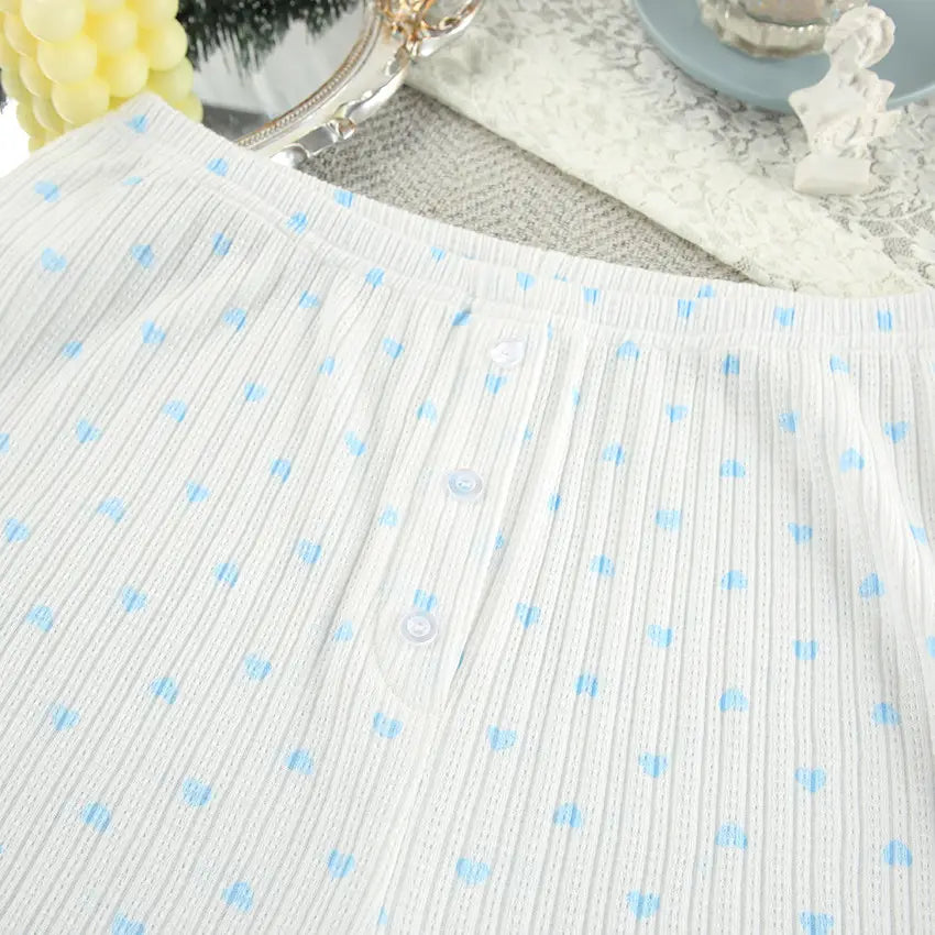 white ribbed fabric top with light blue polka dots and clear buttons featuring knitted heart printing for a heart printing comfortable loungewear set