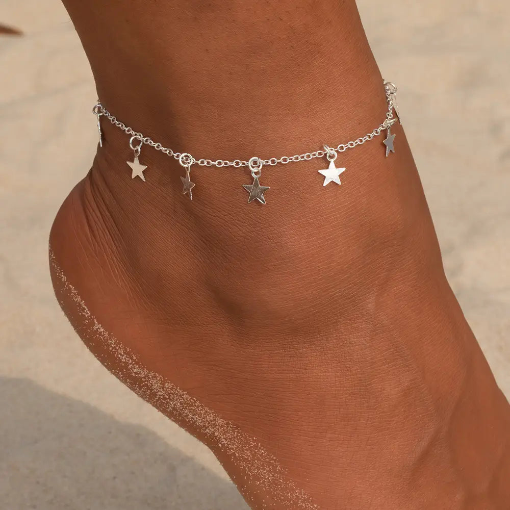 silver star fashion anklet jewelry featuring a simple star fashion design with a delicate silver chain and dangling charms perfect as fashion anklet jewelry.