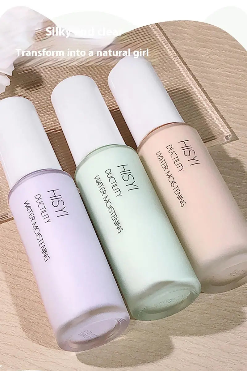 three sleek cylindrical hsyi silky clear makeup primer bottles in soft lavender mint green and peach hues with white caps for hydrating and moistening the skin