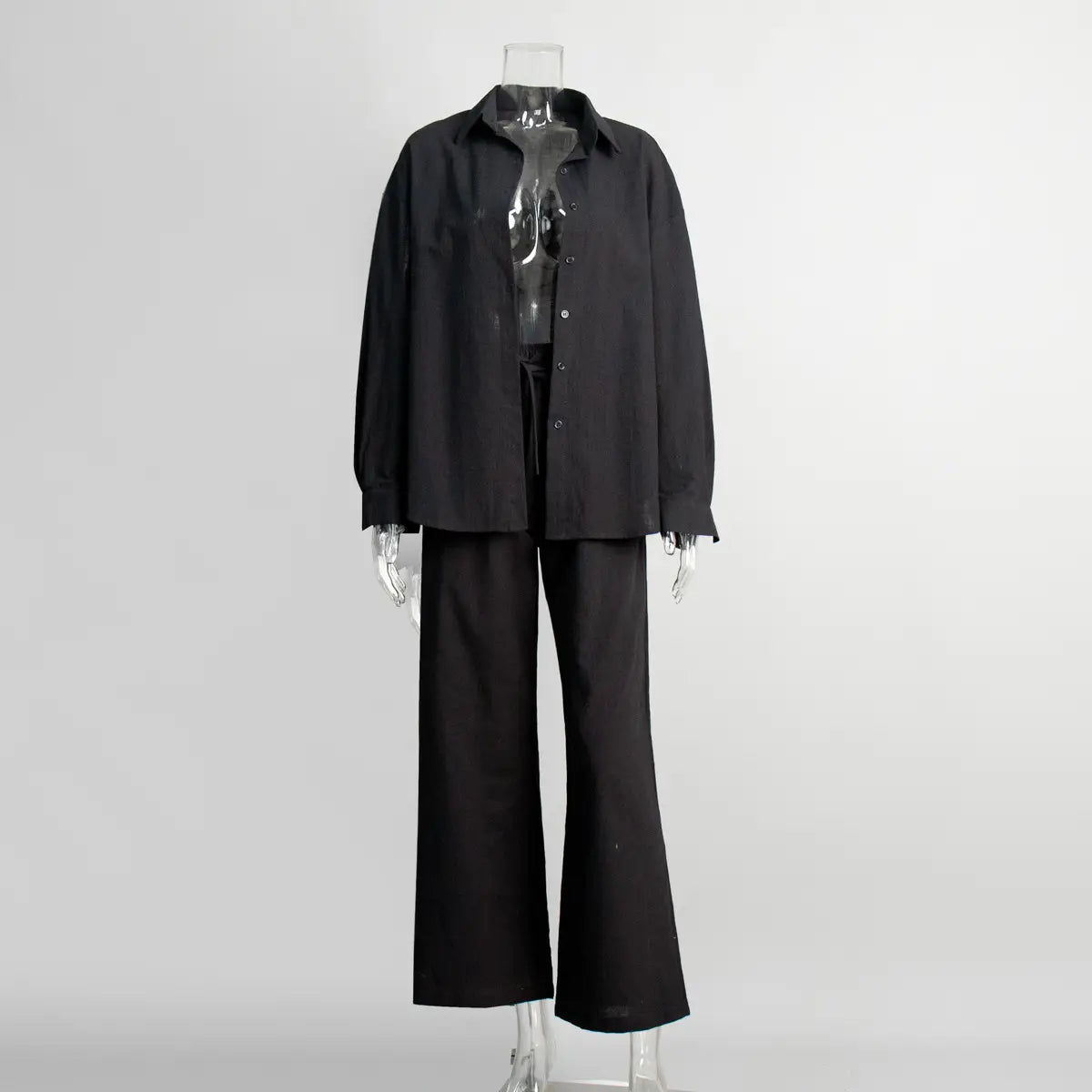 black oversized long sleeve cotton shirt trousers suit with wide-leg trousers and button-up shirt