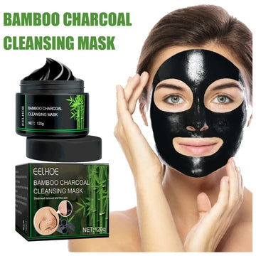 Bamboo charcoal blackhead removal peel-off mask in a sleek black jar with green accents and matching box shown with glossy facial sheet mask applied
