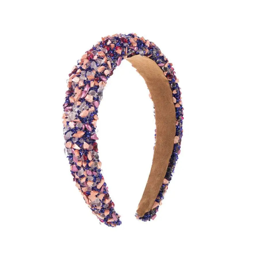 Decorative baroque colorful headband adorned with pink purple and clear sparkling gemstones in mosaic design