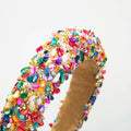 Baroque colorful headband with vibrant rainbow beads and sparkling gemstones design adorned for elegant wear