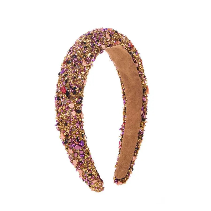 Baroque colorful headband design adorned with glittering gold and pink beads and sparkling gemstones with suede interior
