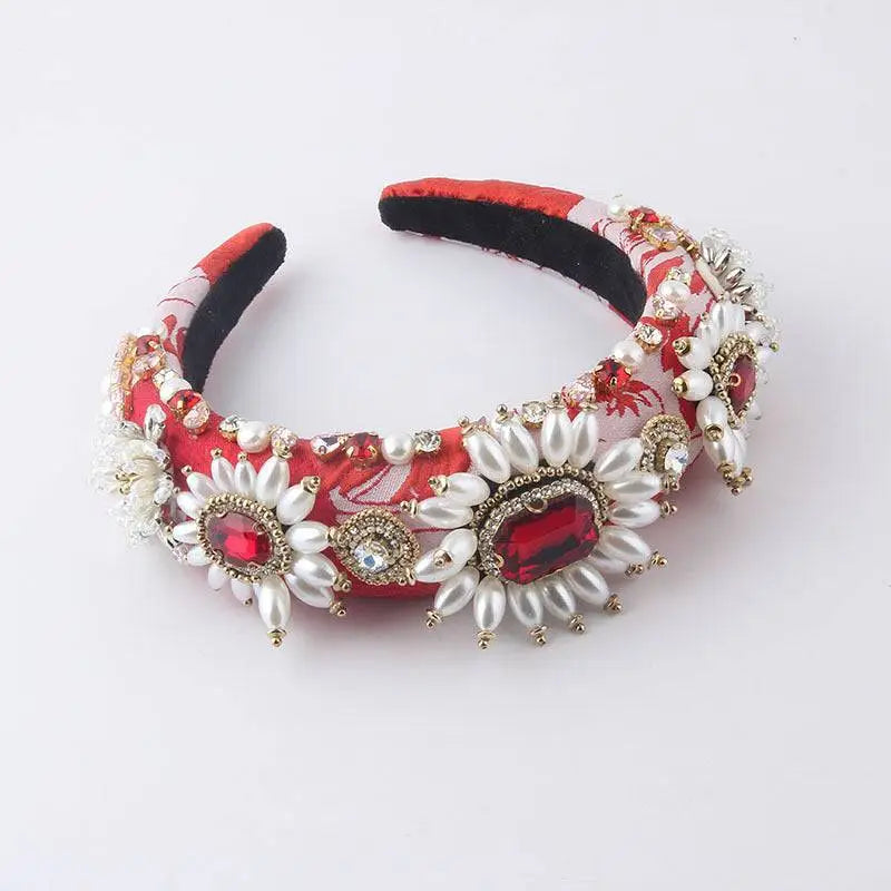 Baroque light luxury rhinestone pearl headband with red and white pattern, pearl beads, gold accents, and red gemstones