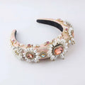 A blush pink velvet baroque light luxury rhinestone pearl headband with white pearls and gold floral embellishments