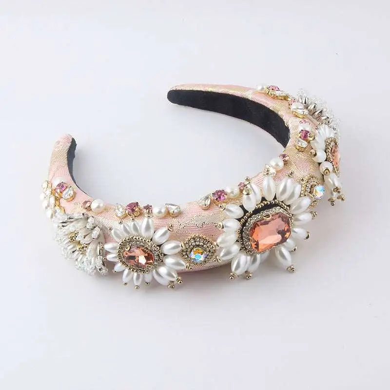 A blush pink velvet baroque light luxury rhinestone pearl headband with white pearls and gold floral embellishments