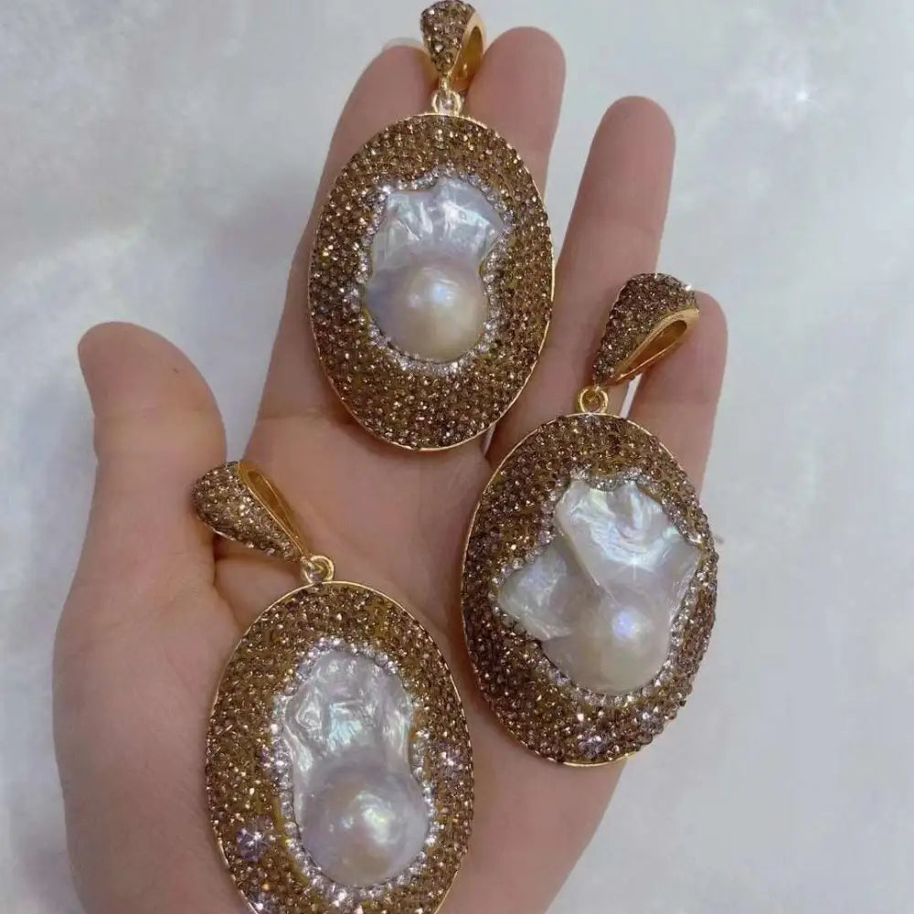 A gold-toned baroque pearl necklace ring suit with crystal settings designed as a luxurious bride ornament