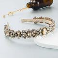Baroque vintage court style headband featuring clear and amber crystals on a brown suede-like band