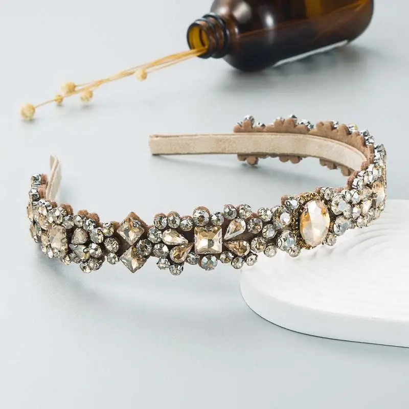 Baroque vintage court style headband featuring clear and amber crystals on a brown suede-like band