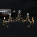 Baroque vintage female crown bridal jewelry in gold tone adorned with sparkling black and clear teardrop crystals