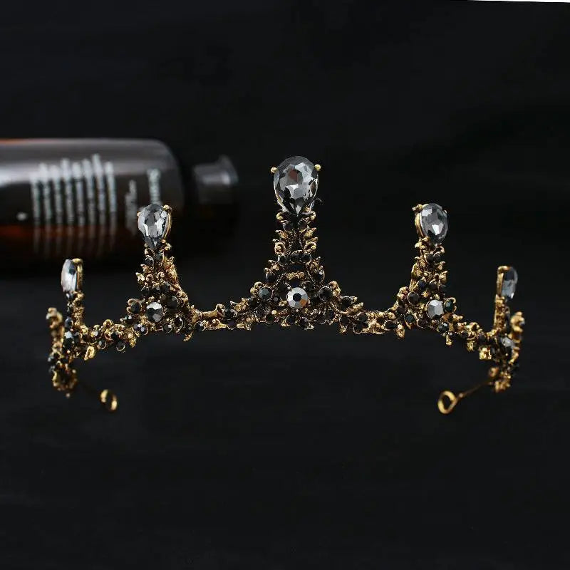 Baroque vintage female crown bridal jewelry in gold tone adorned with sparkling black and clear teardrop crystals