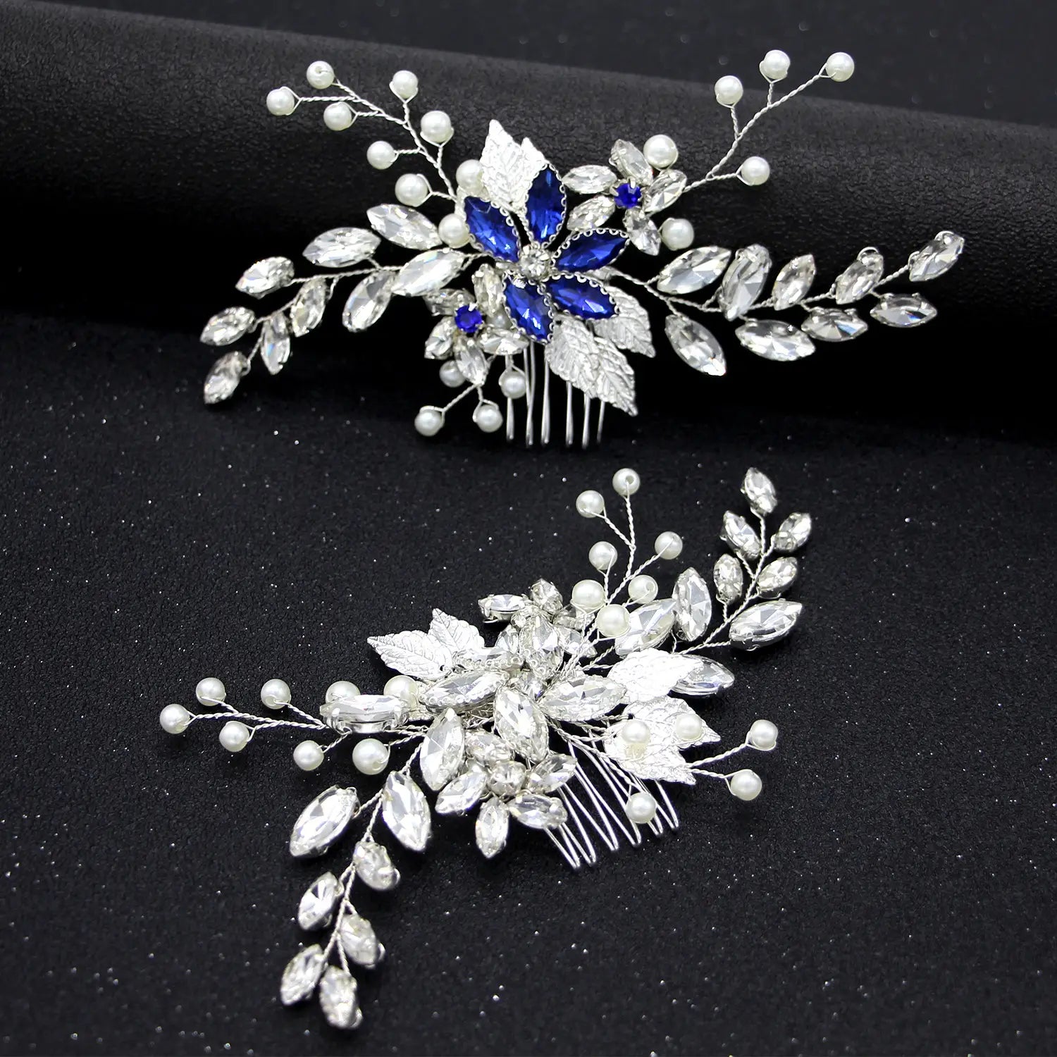 Elegant silver hair comb headdress adorned with clear crystal leaves, pearl accents, and a central blue gemstone flower for silver crystal gauze dress accessories.