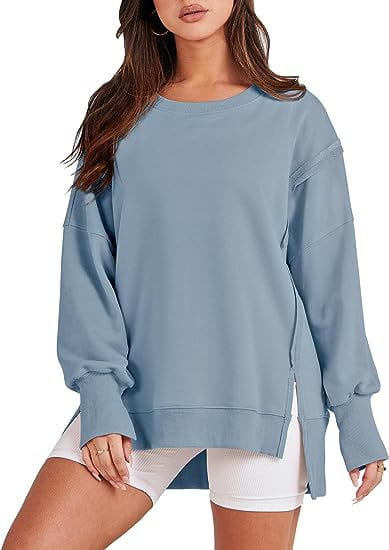 Light blue solid oversized sweatshirt crew with side slits and ribbed cuffs in a casual style