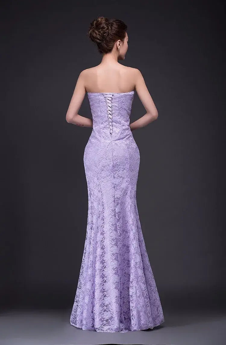a lavender lace wedding dress long dress fuchsia with a strapless corseted back and intricate floral patterns in a mermaid silhouette