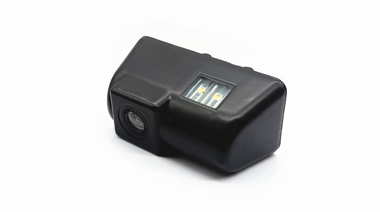Black plastic hd night vision reversing rear view camera with integrated led lights shown from the back side for enhanced night vision reversing safety.