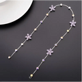 Beaded pink floral wedding hair accessories featuring a delicate silver chain with purple and clear crystal flowers
