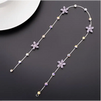 Beaded pink floral wedding hair accessories featuring a delicate silver chain with purple and clear crystal flowers