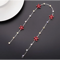 Beaded pink floral wedding hair accessories featuring a delicate silver chain with red crystal flowers and clear beads