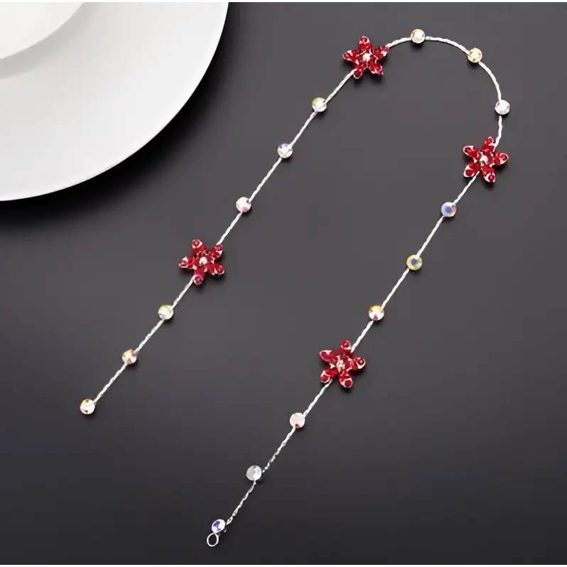 Beaded pink floral wedding hair accessories featuring a delicate silver chain with red crystal flowers and clear beads