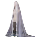 Delicate translucent white yarn wedding bridal veil with intricate beaded trailing yarn trim and broadband hair comb