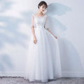 A beaded white tulle banquet evening dress with sheer three-quarter sleeves and a flowing skirt for dress female spring