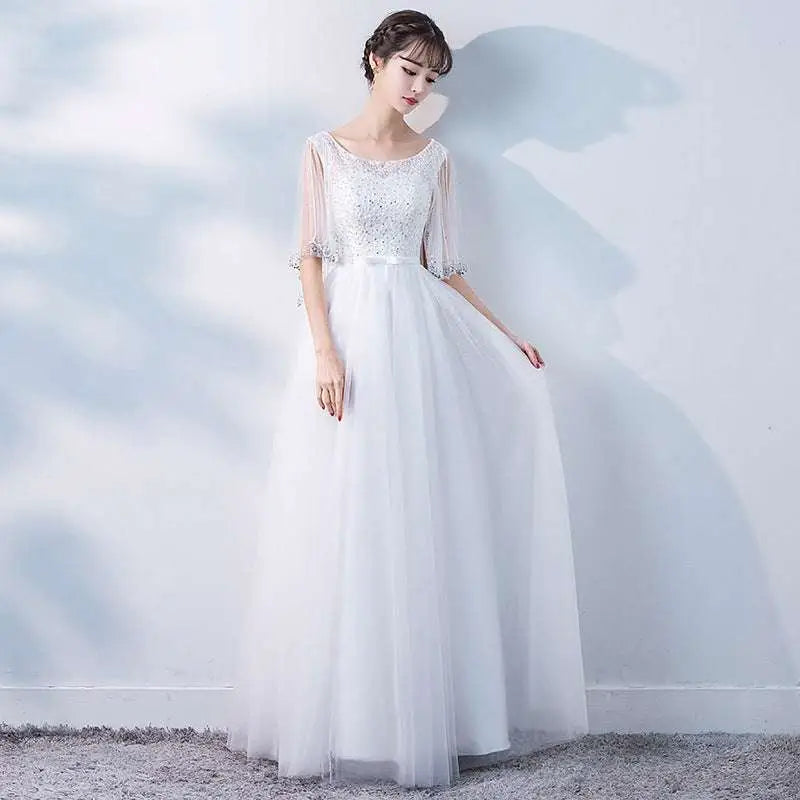 A beaded white tulle banquet evening dress with sheer three-quarter sleeves and a flowing skirt for dress female spring