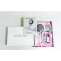 Silver and white beauty care slimming device handheld ultrasound massager with sleek modern design for facial use