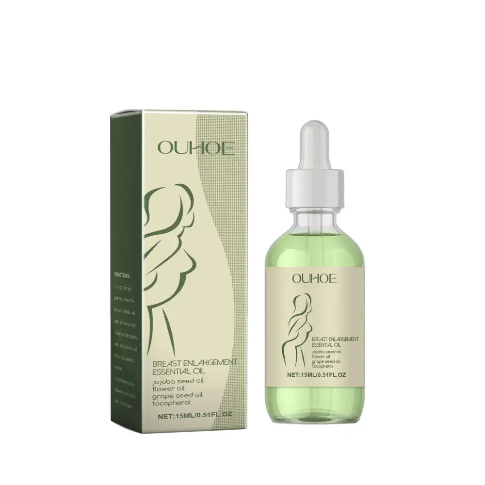 Ouhooe beauty milk oil breast enlargement essence in a clear glass bottle with white dropper cap and light green grape seed oil