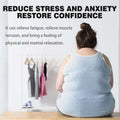 A woman wearing a light blue ribbed tank top sits on wood showcasing the bee venom lymphatic slimming patch for body tightening