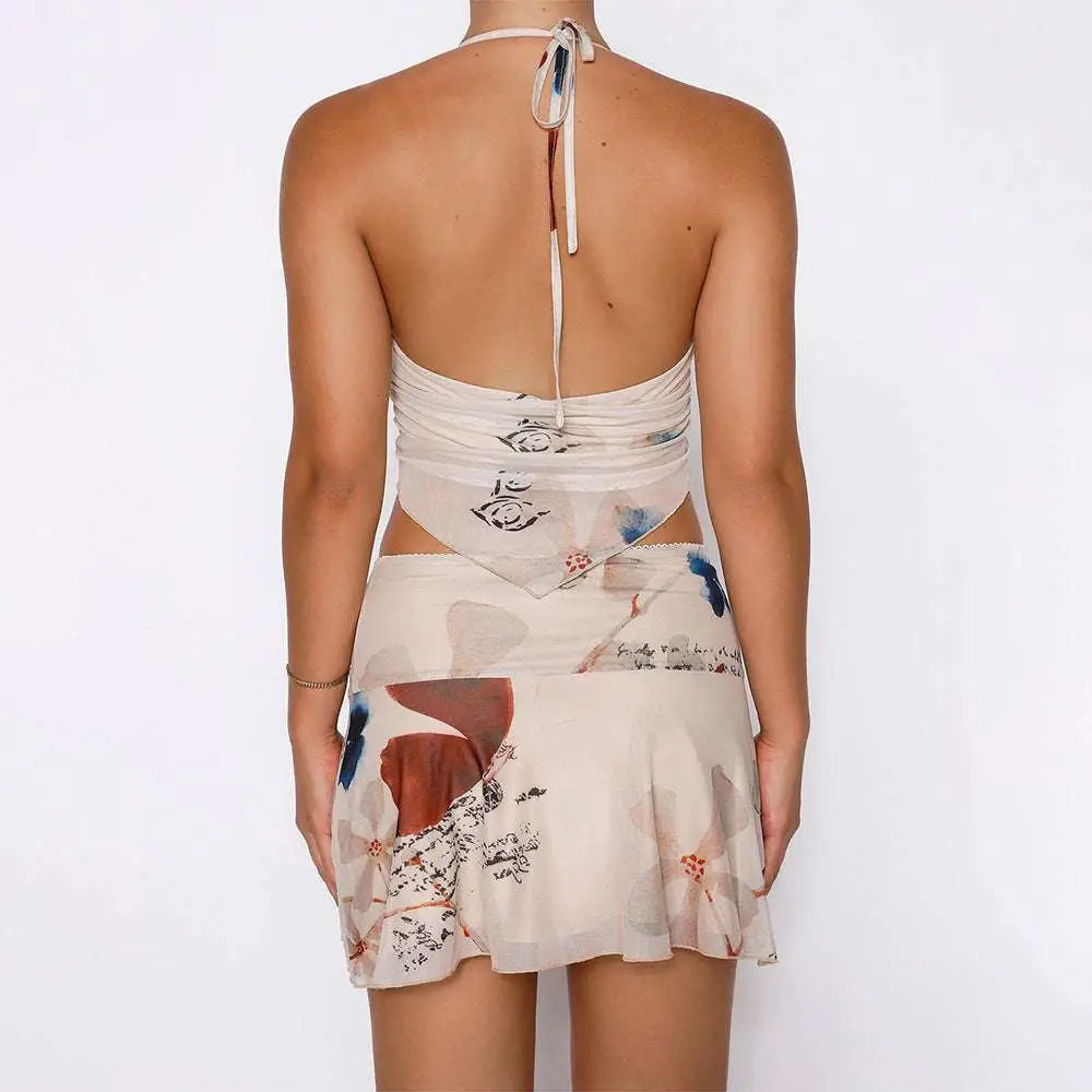 Back view of a beige 2pcs printed suit summer sexy halter skirt set with a backless cream mini dress in semi-sheer fabric