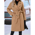 Beige double breasted trench coat with matching belt and silver buttons ideal for belt winter fashion outerwear