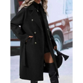 Black double breasted trench coat with silver buttons and belted waist for stylish belt winter fashion use