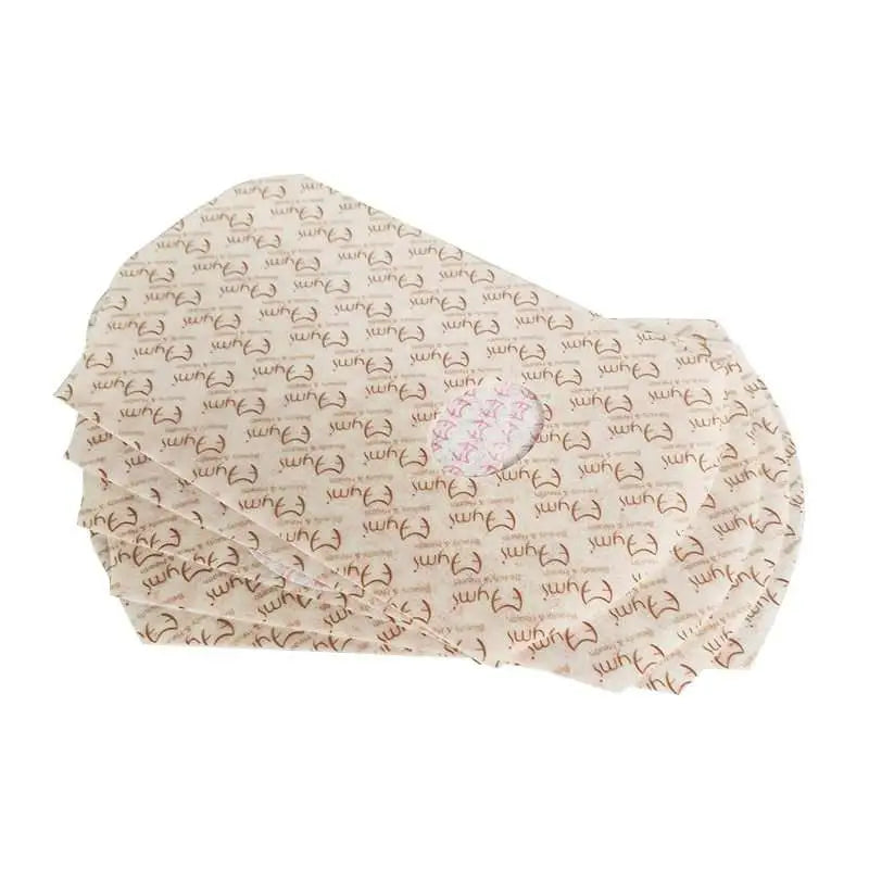 Beige fabric body wrap patch with brown yuh logo pattern on paper cupcake liners for royale essence lux waist slimming