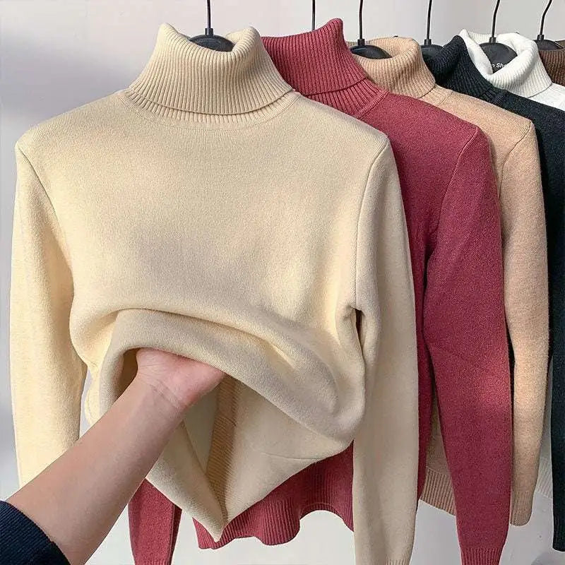 Beige fleece turtle neck sweater winter pullover with cream-colored soft ribbed knit texture and long sleeves